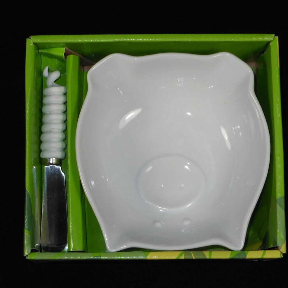 new pig face porcelain dipping bowl with spread knife. Boston Warehouse